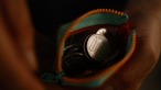 vibram coin pouch keychain (silver×orange) with orange glowing zip