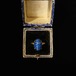 Blue banded oval ring