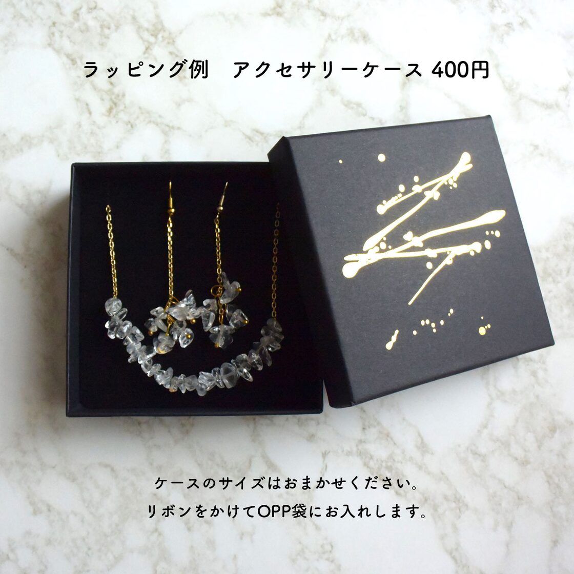 ステンレス製 雪の結晶のコイン型ピアス ゴールド/シルバー