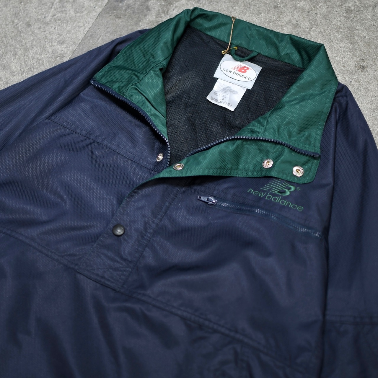 New Balance half snap design nylon pullover