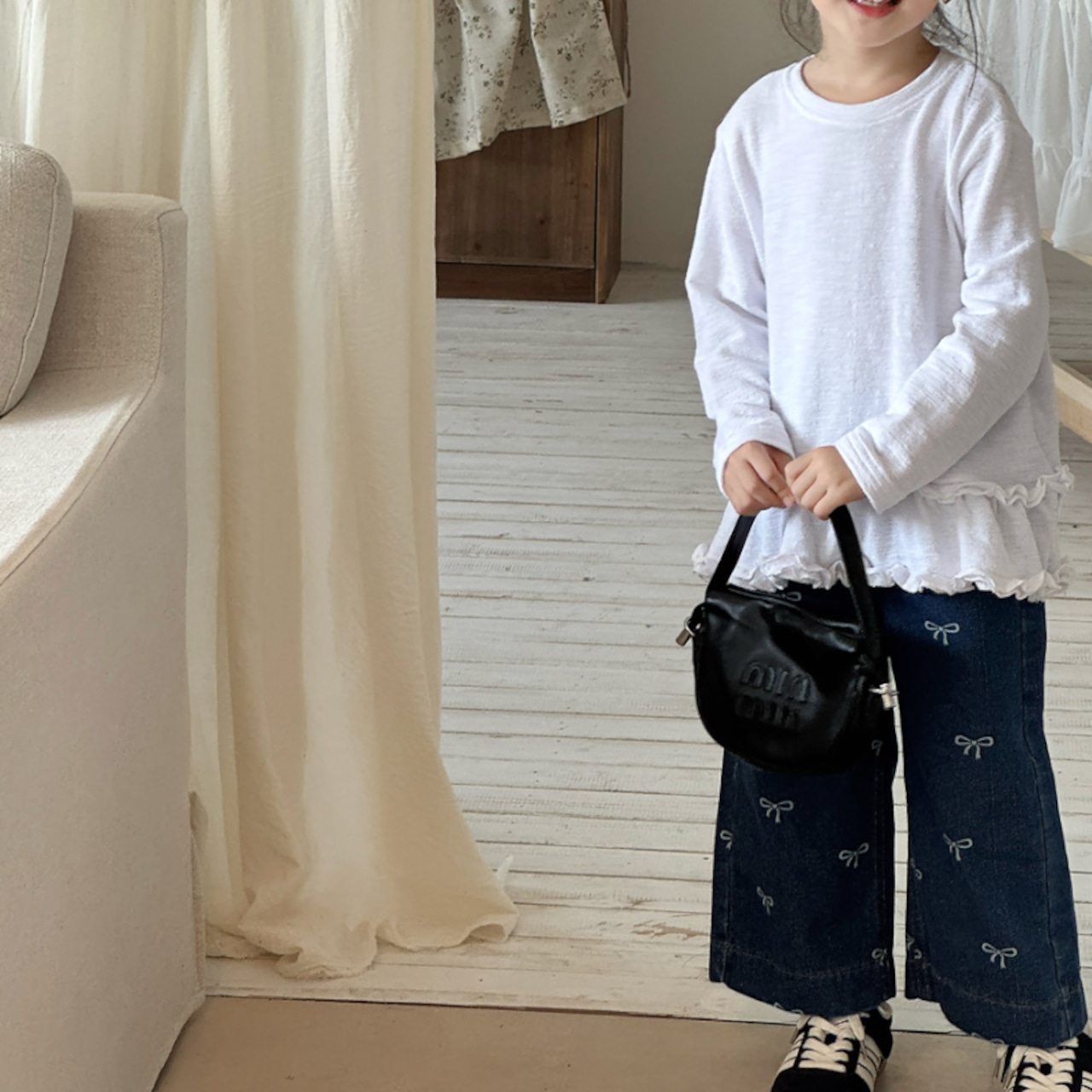 秋リボン柄フレアジンズ