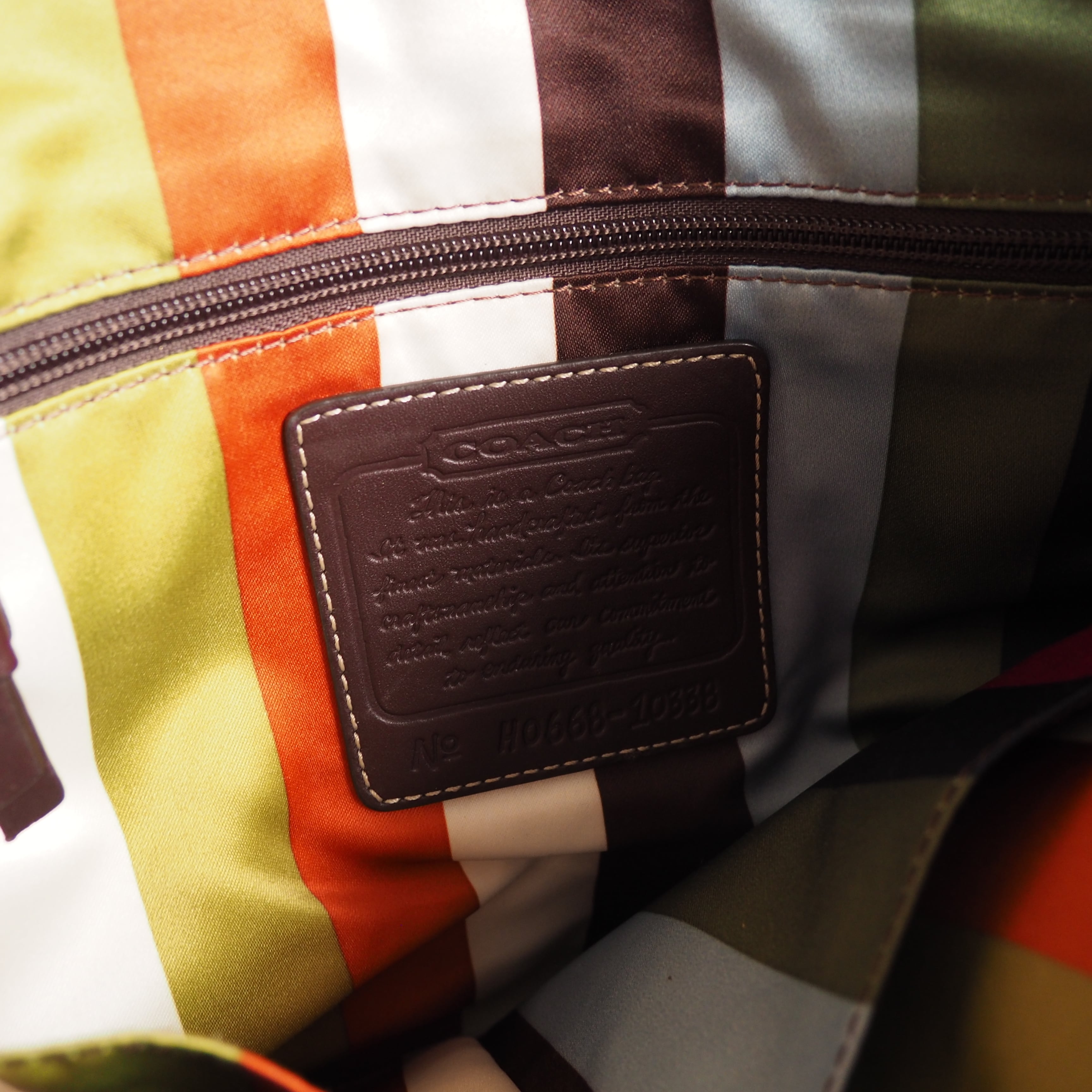 ” Coach ” Gold paint coating × signature textile Hand Bag