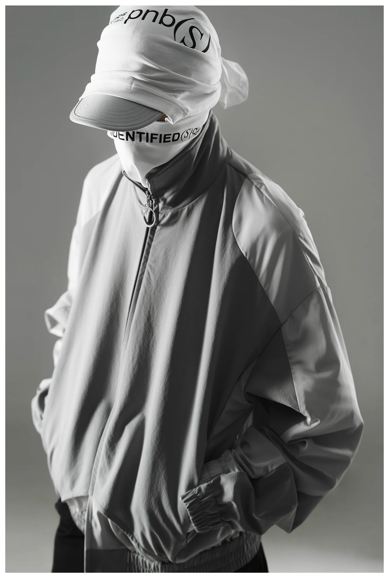 SQUD デコンストラクトパッチワークルーズハイネックトラックジャケット