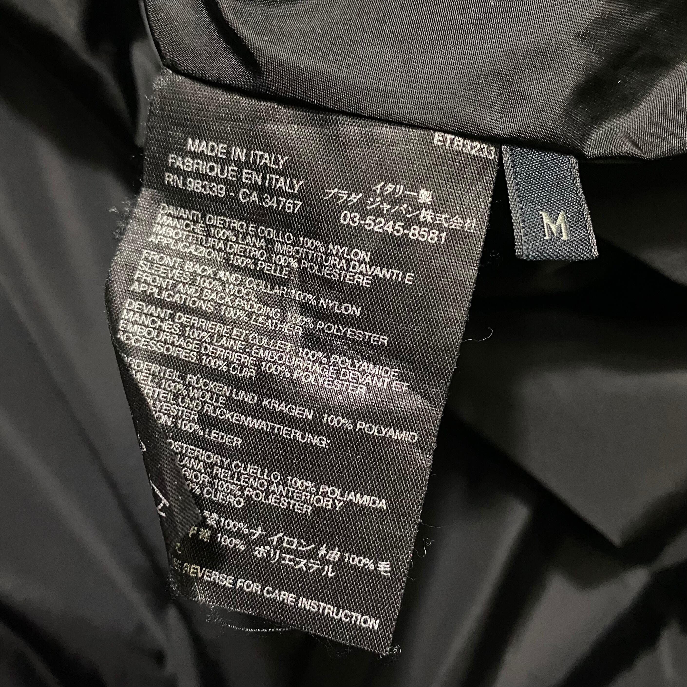 PRADA knit sleeves black nylon jacket | NOIR ONLINE