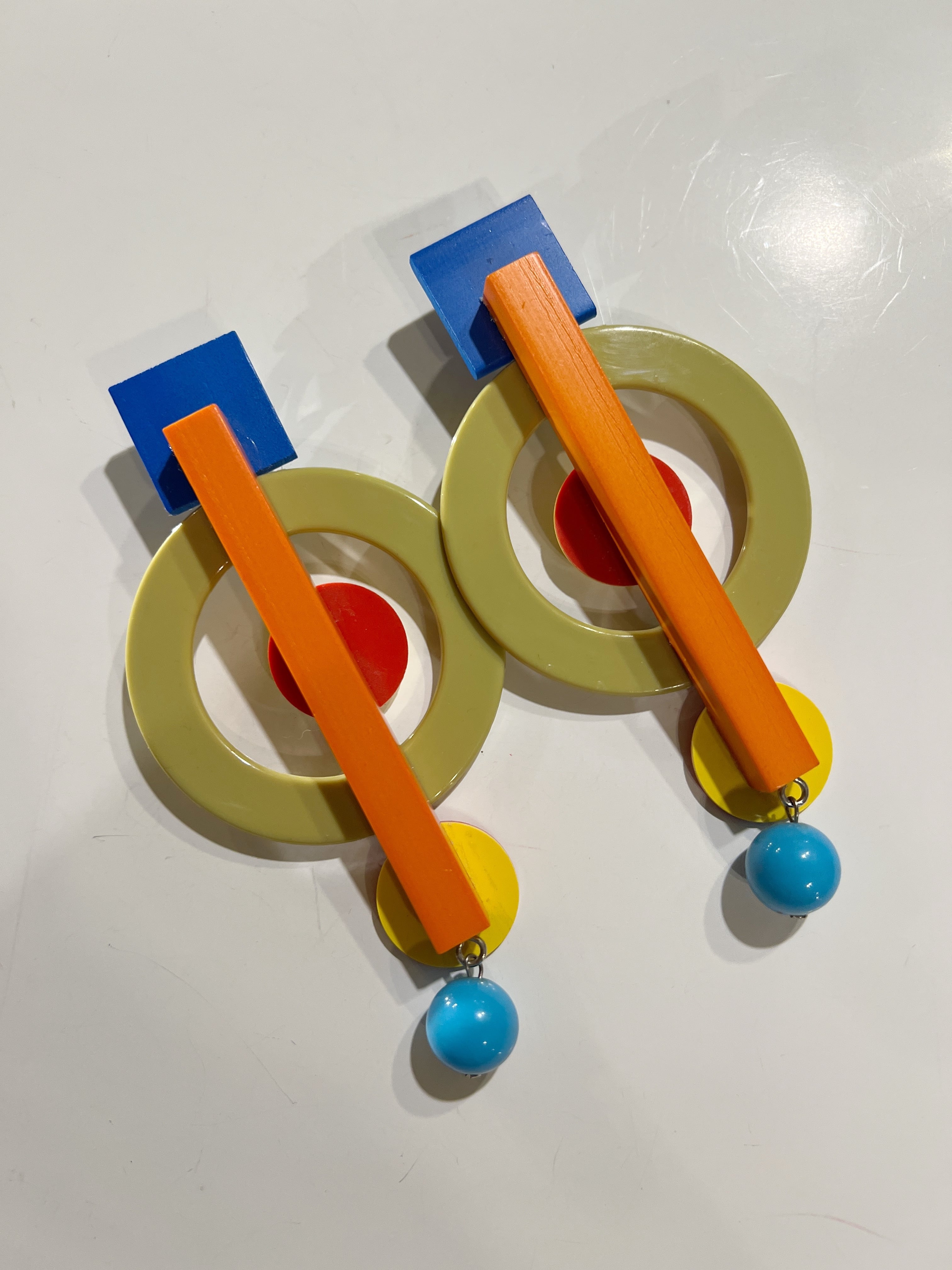 Designer's big earrings