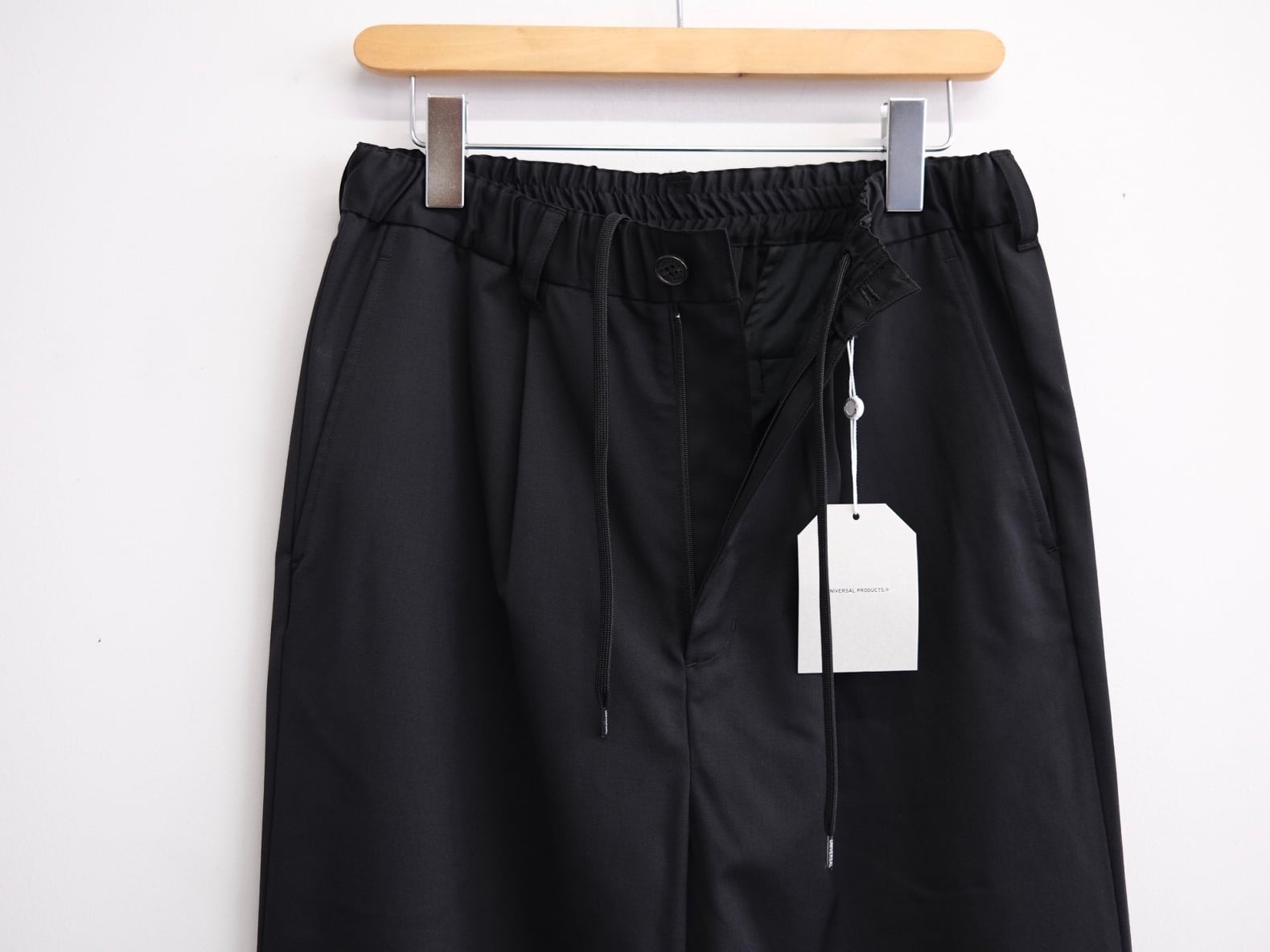 UNIVERSAL PRODUCTS.” WOOL EASY TROUSERS” | Lapel online store