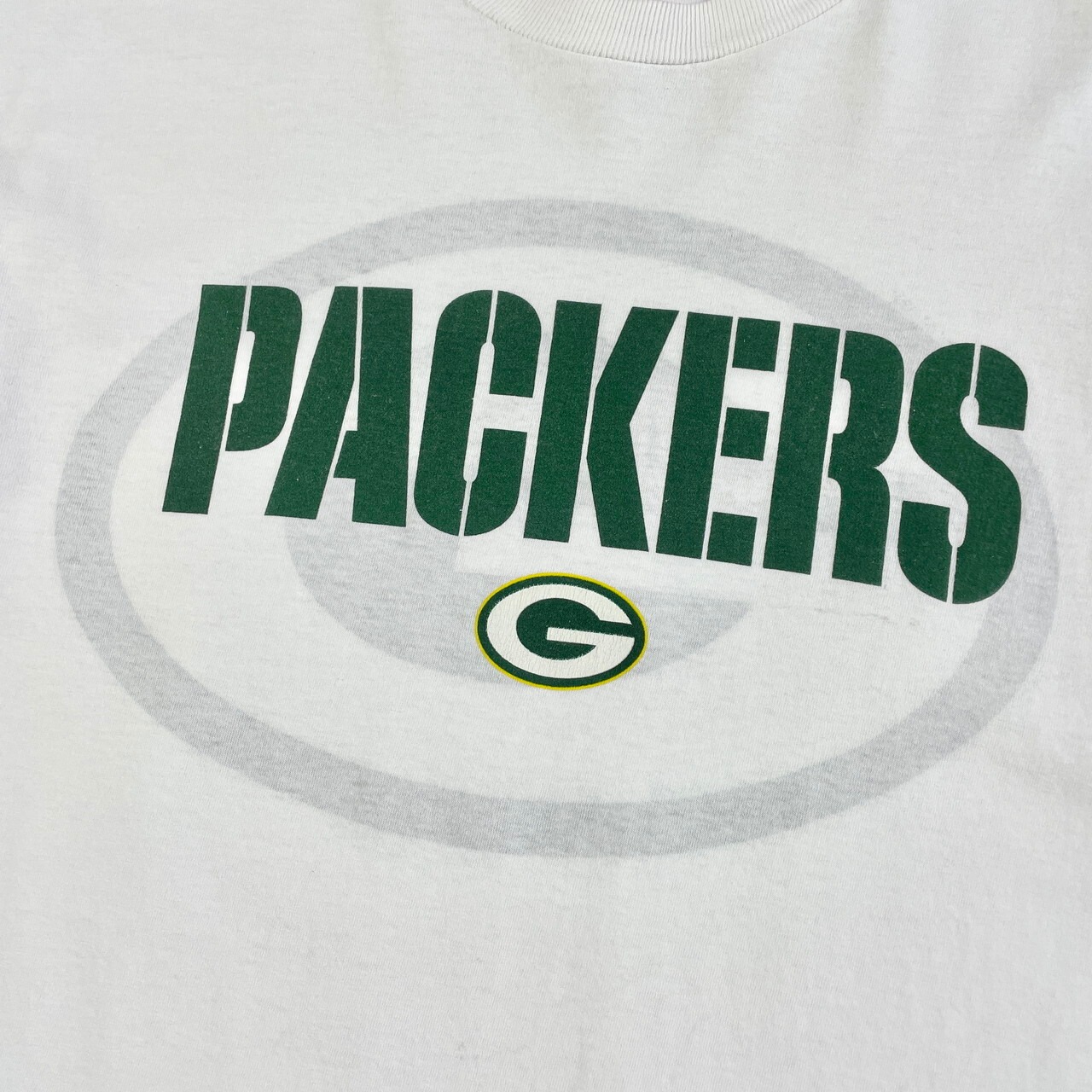 90年代 NFL GREEN BAY PACKERS チームロゴ Tシャツ メンズL 古着 90s 