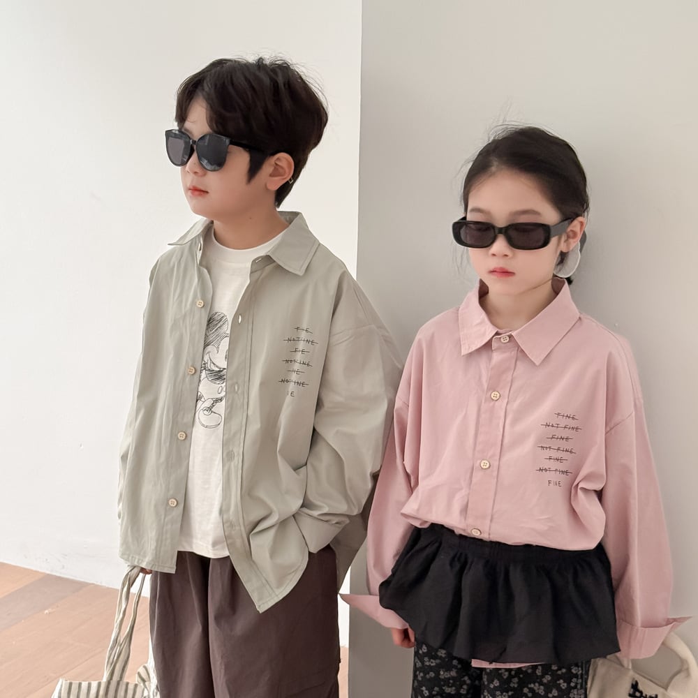 裾デザイン英字シャツ