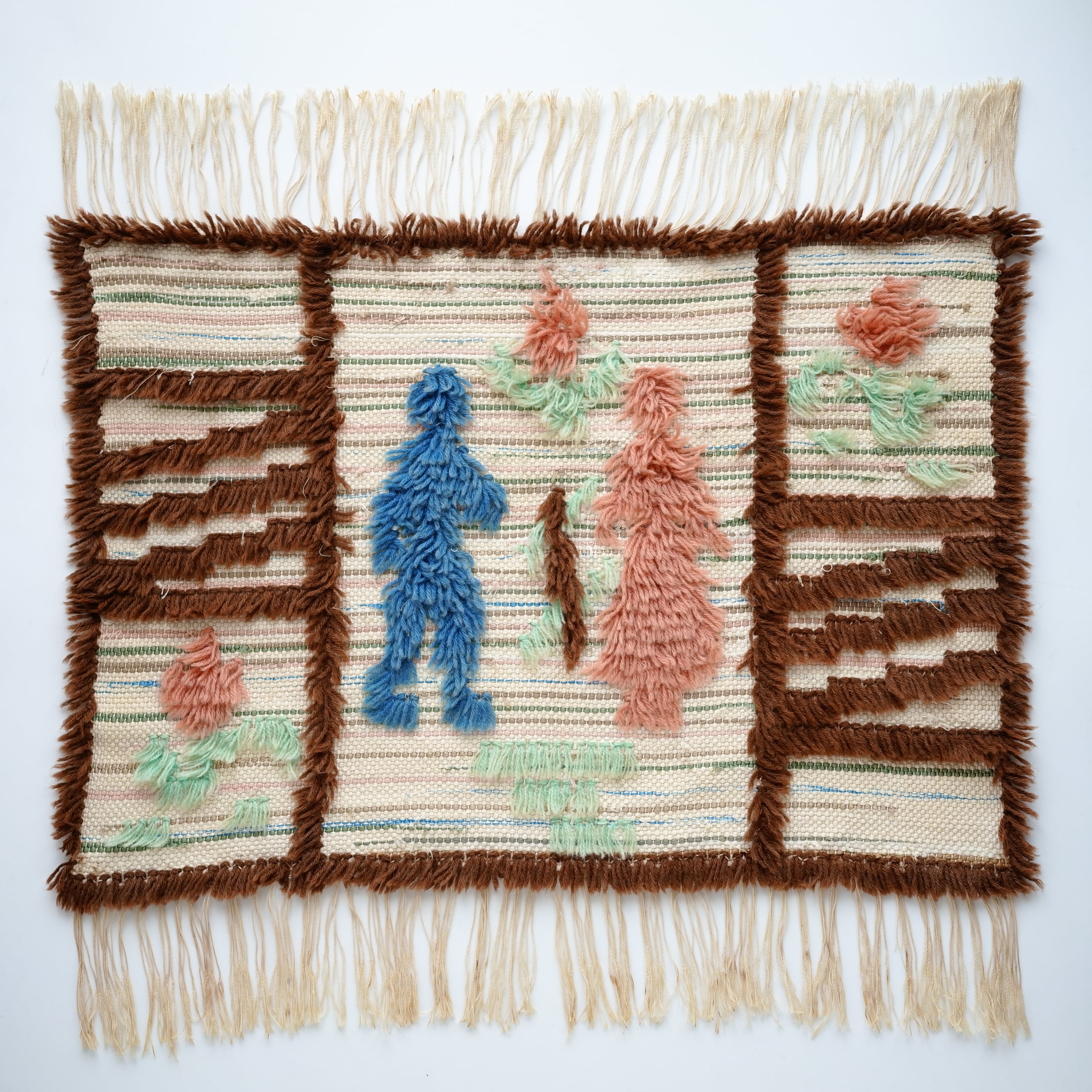 Ryijy / Two Figures and Flowers