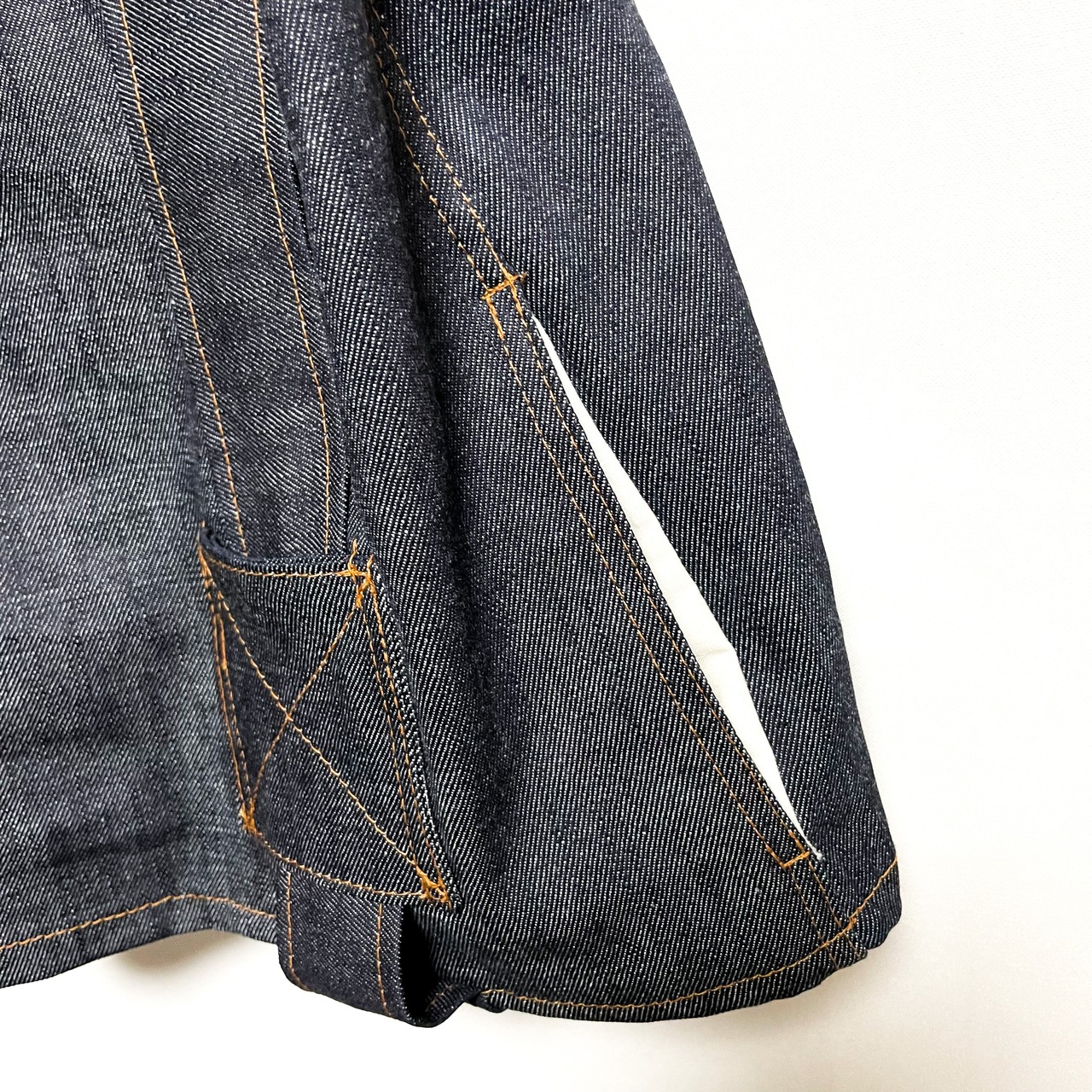 UNFINISHEDパラシュート2wayトップス