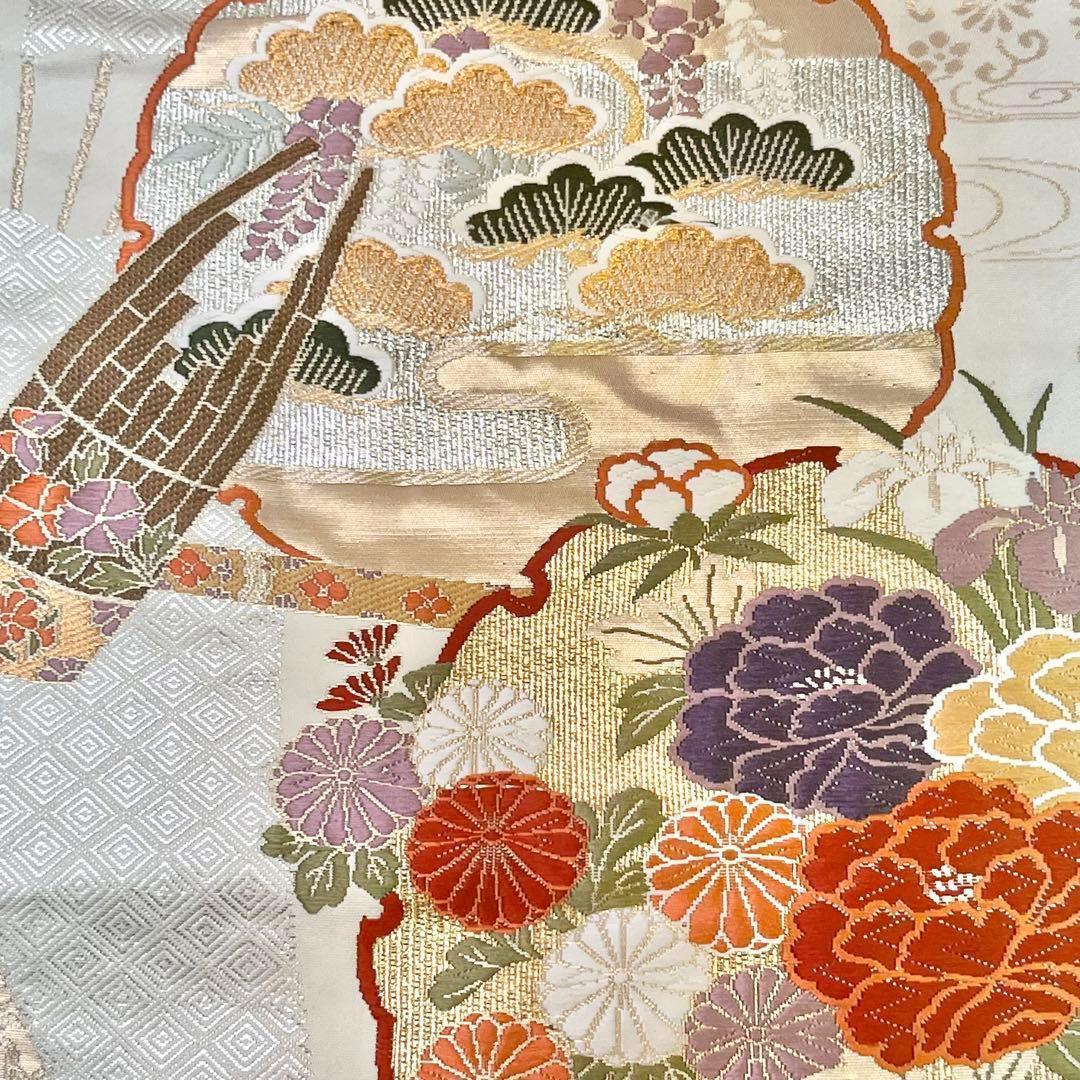 袋帯 唐織 都つづれ 雪輪に美しい花柄模様 金銀糸 乳白色 O-3801  