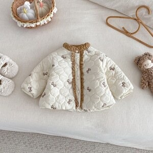 【冬作】蝶結び柄暖かいアウター