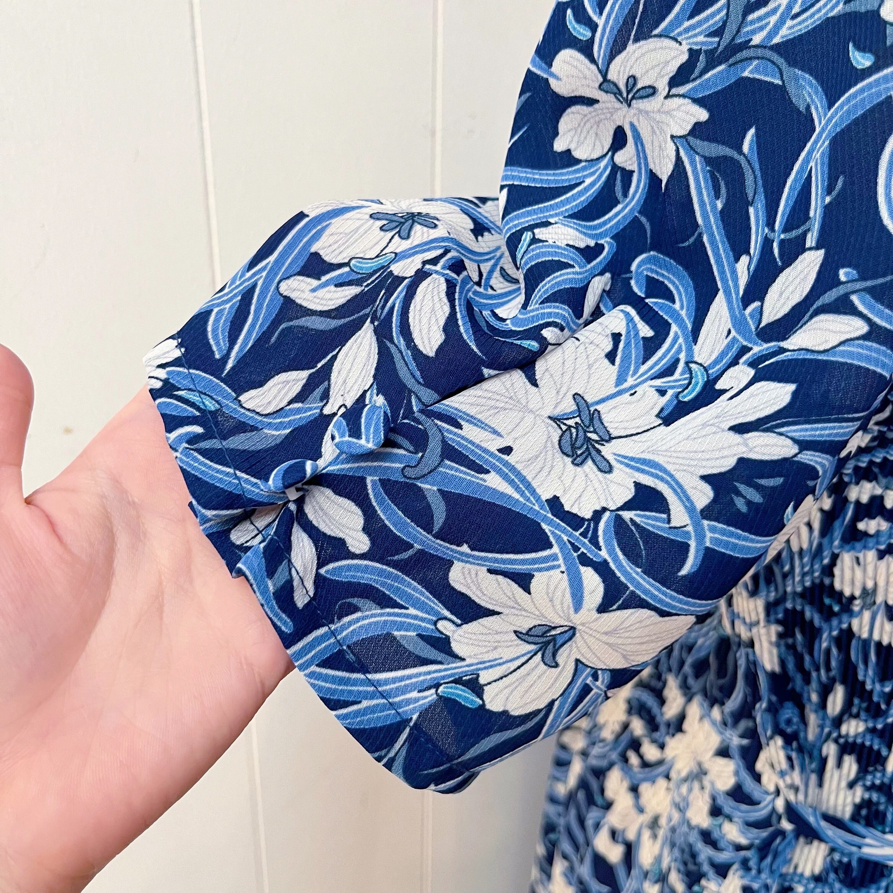 white lily blue pleats one-piece