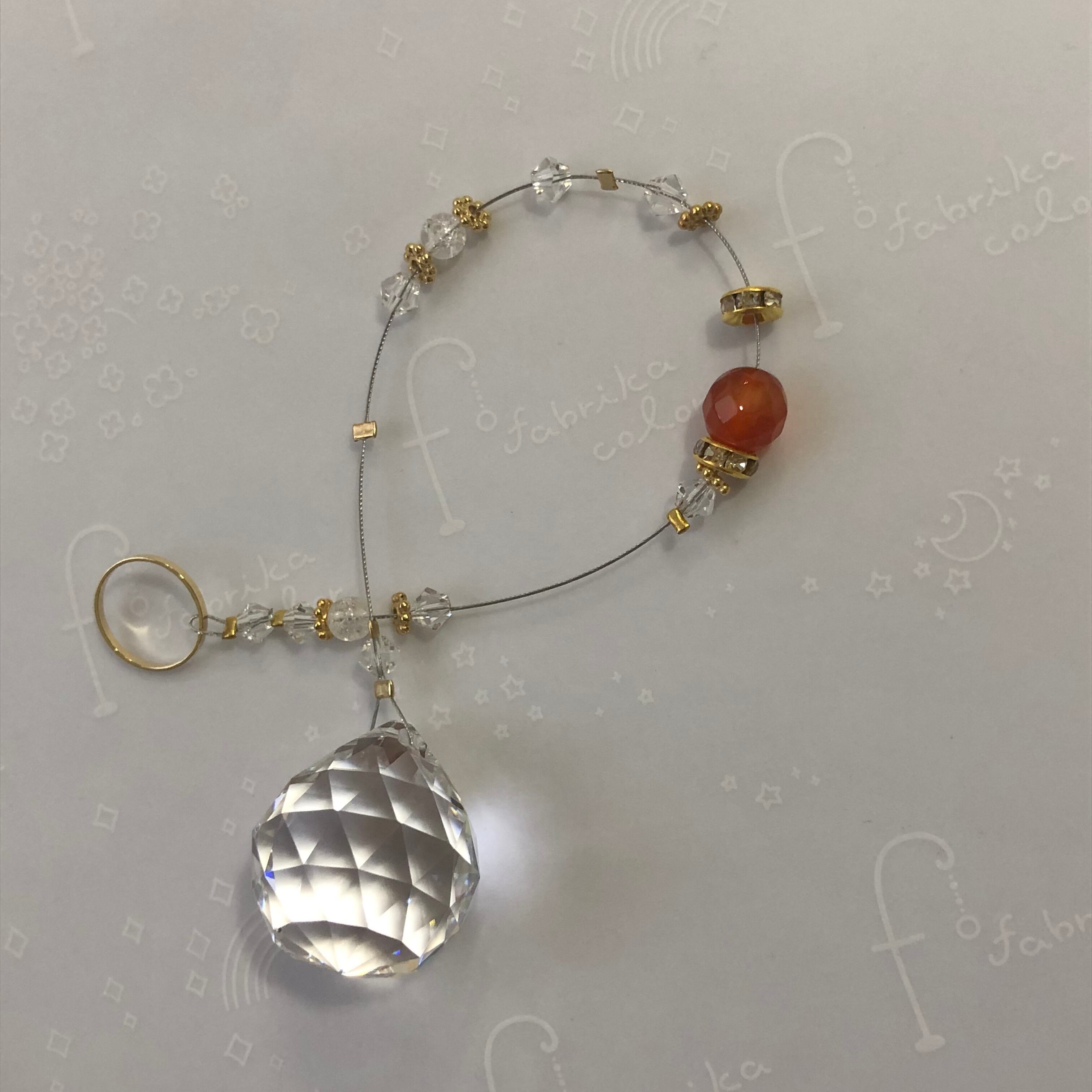 蓄光するスノークリスタルのチャーム【7月カーネリアン】 蓄光するスノークリスタルのチャーム【7月カーネリアン】