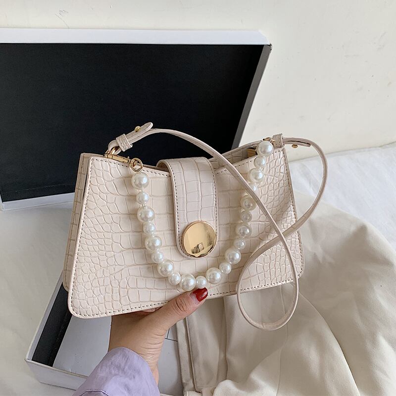 夏の小さなバッグ女性バッグ2020新しい波のテクスチャワイルドパールショルダーメッセンジャーバッグinsファッション脇の下バッグ Tiancai_Wing_Bag6868876