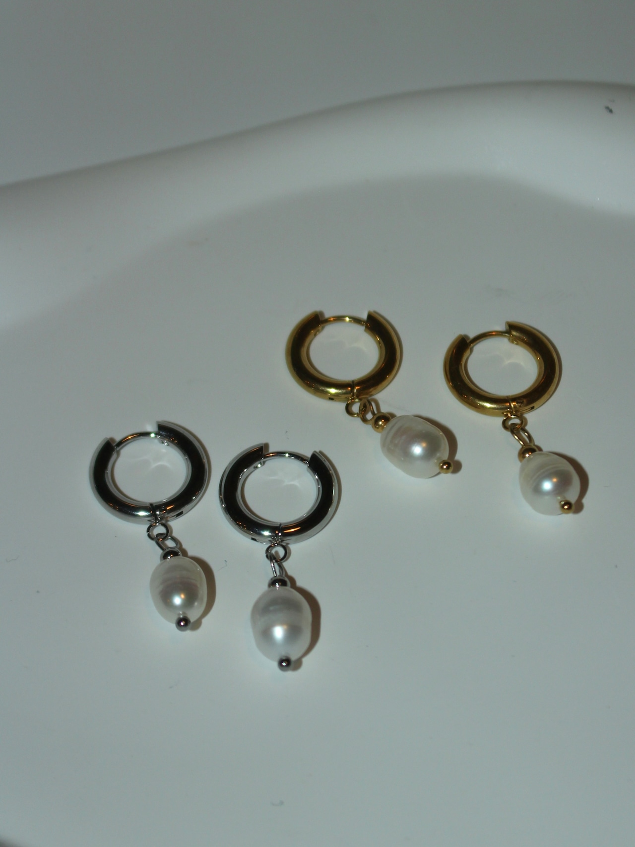 Fresh pearl hoop pierce