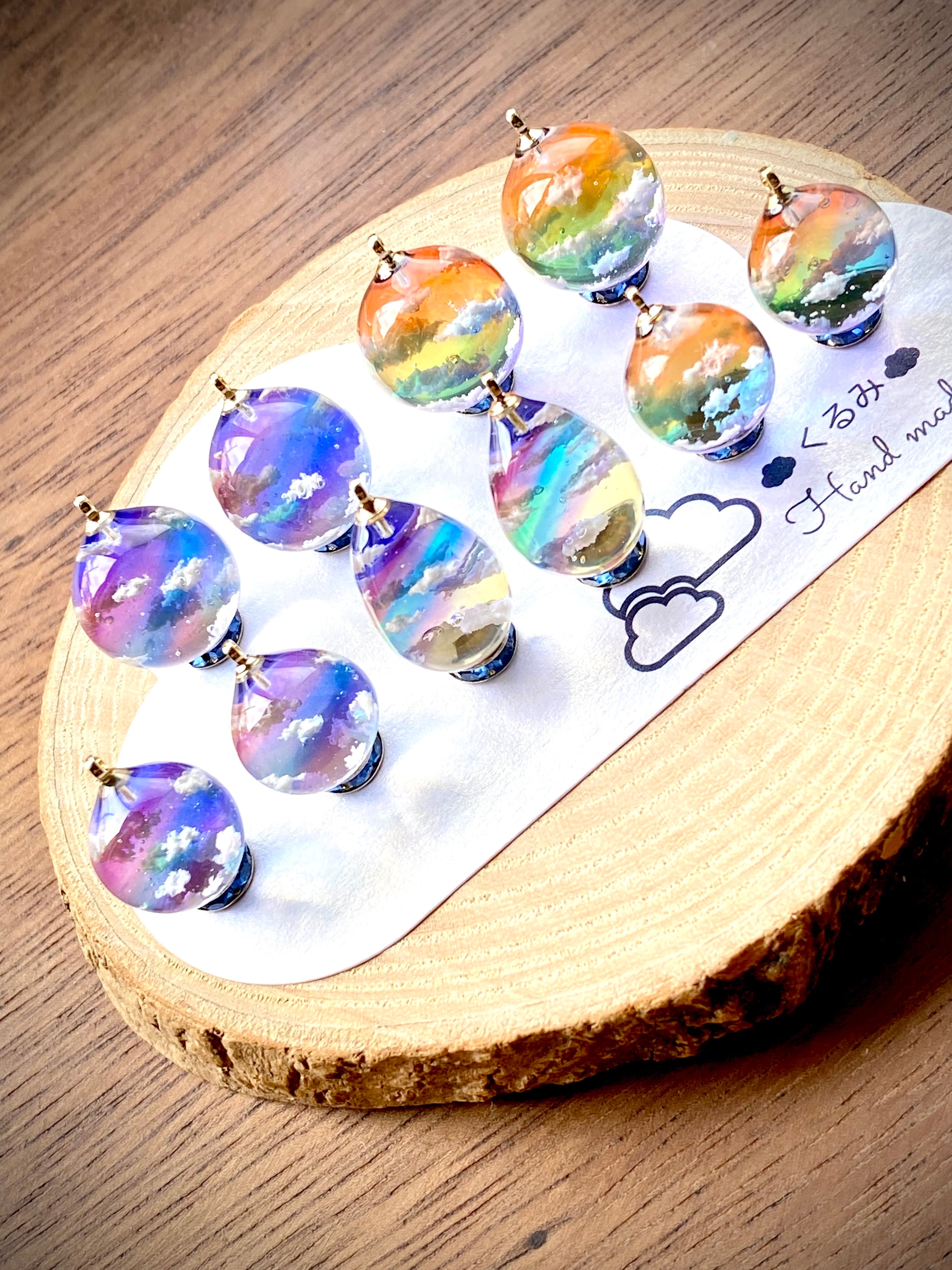 レジンピアス イヤリング 夕暮れ空にかかる虹 たまご型16×12mm a | PAY ID
