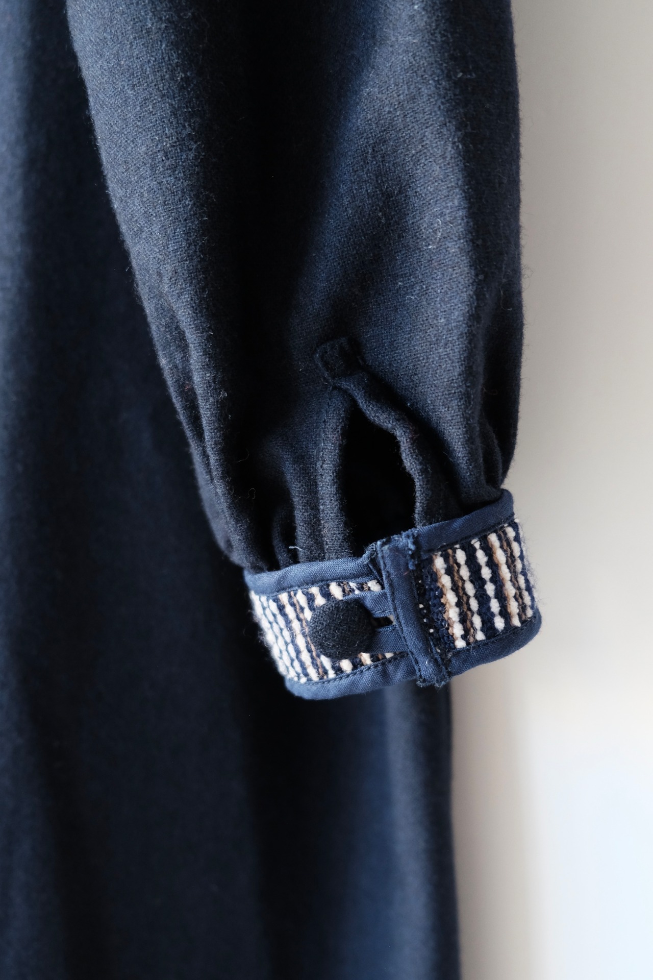 Navy wool dress with woven yoke
