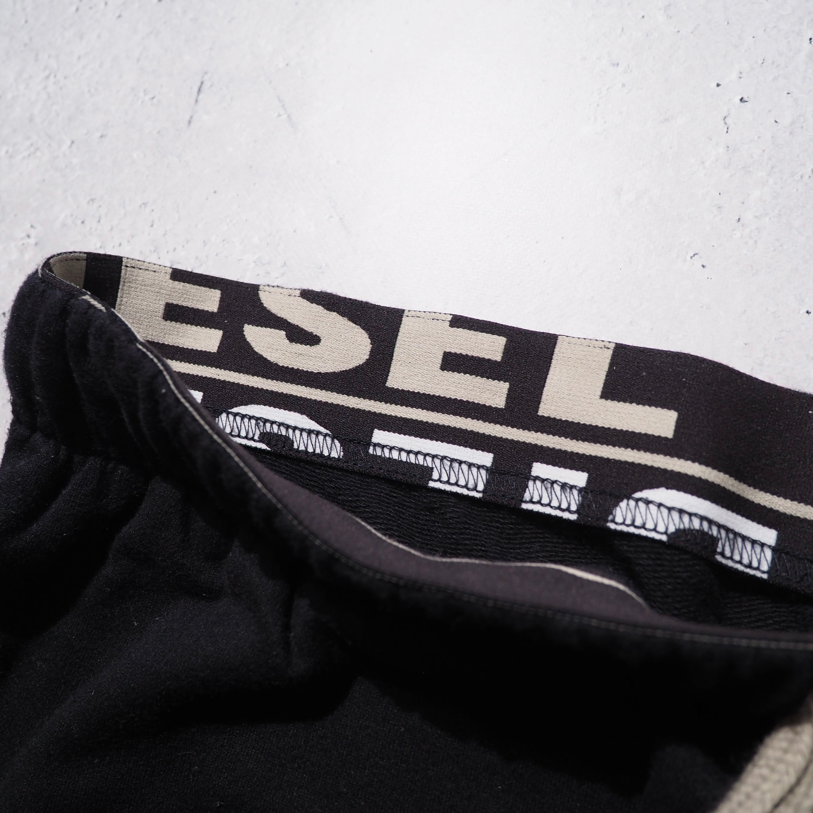 ” DIESEL ” Graphic logo printed wide Sweat pants
