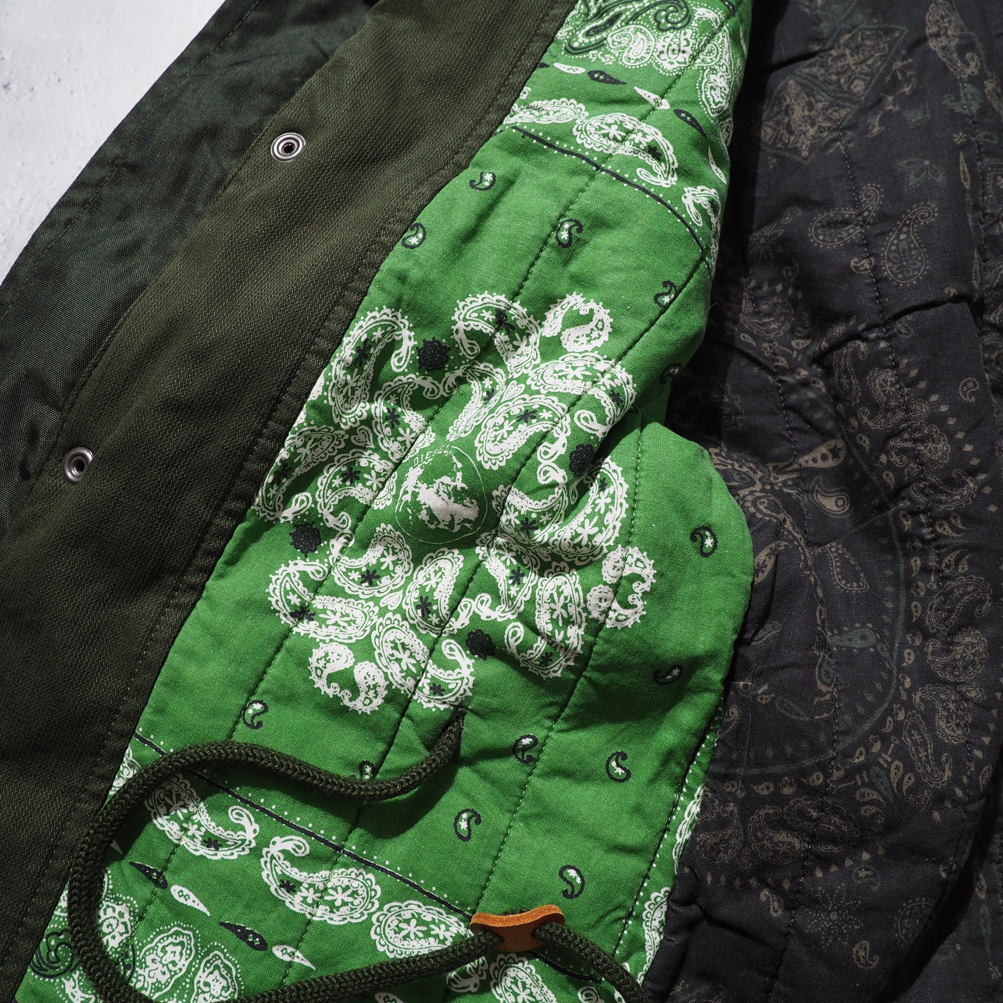 " DIESEL " Big Pockets × Switching nylon High neck Military jacket