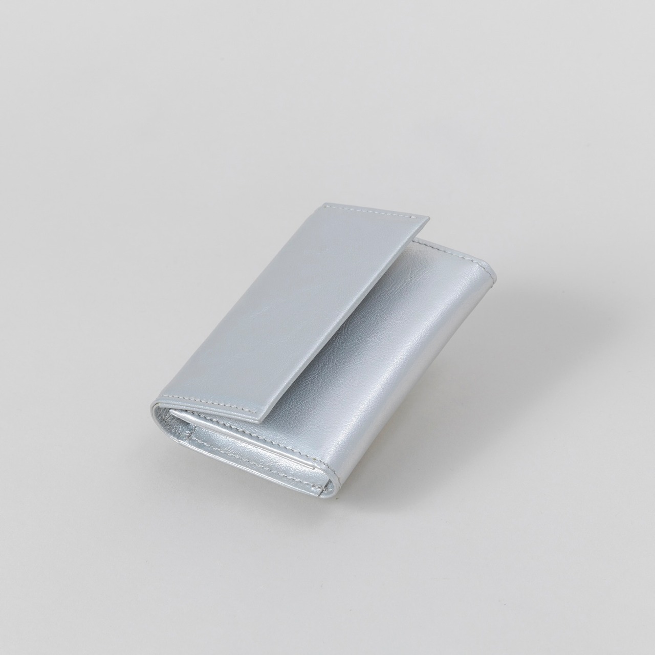 E R A. SPRKNG BUSINESS CARD CASE