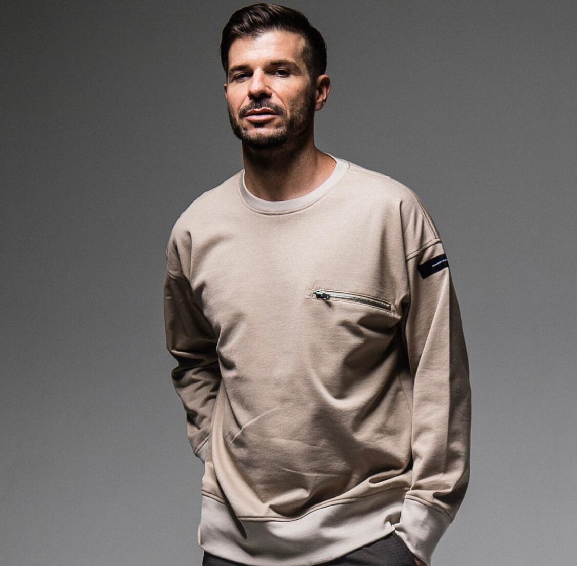 RESOUND CLOTHING / fastener pocket trainer BEIGE