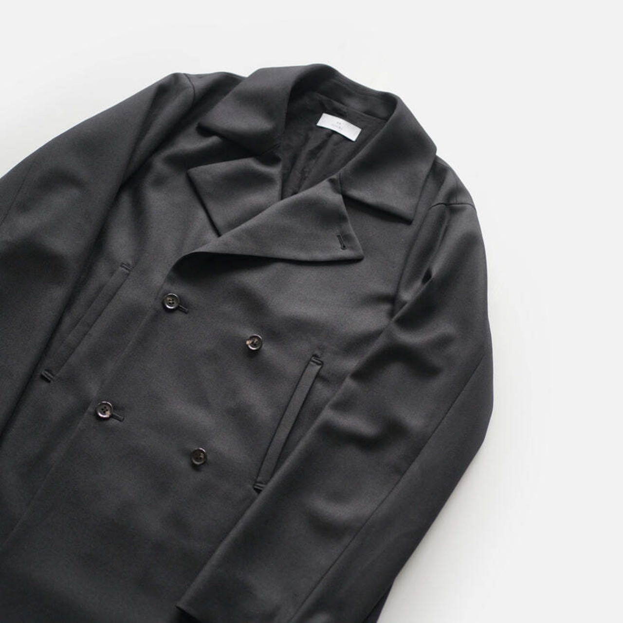 itochi - 4ply wool twill double breasted half coat : black (イトチ : 4プライ ウールツイル ダブルブレスト ハーフコート : ブラック)
