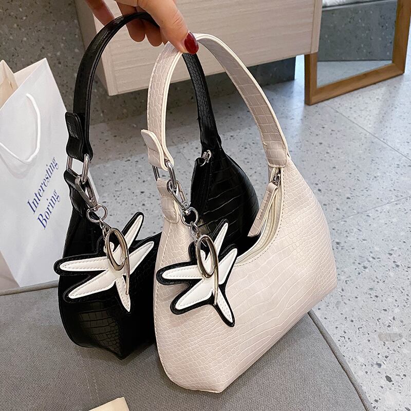 ネットセレブウエスタンスタイルスモールバッグレディースバッグ2020新しいトレンディなファッションワイルドワンショルダー脇の下バッグニッチデザインハンドバッグ Tiancai_Wing_Bag1065967