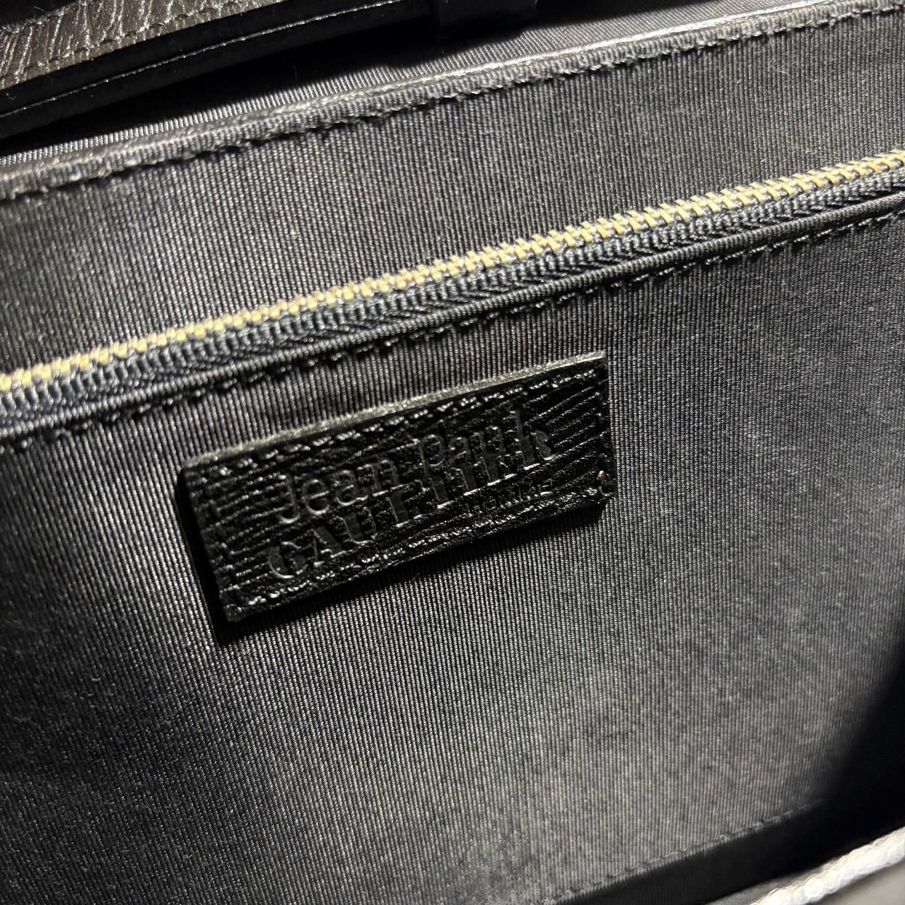 Jean Paul GAULTIER black leather clutch bag