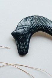 Handmade ceramic crescent cat brooch