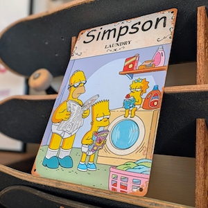 ♡HAPPYなワンシーン♡送料無料!ちょうどいいブリキ看板【 The Simpsons ( シンプソンズ )】『 LAUNDRY ランドリー 』 METAL SIGN / メタルサイン / ブリキ看板 / サインボード / ビンテージ加工 〚アメリカン雑貨 アメトイ〛