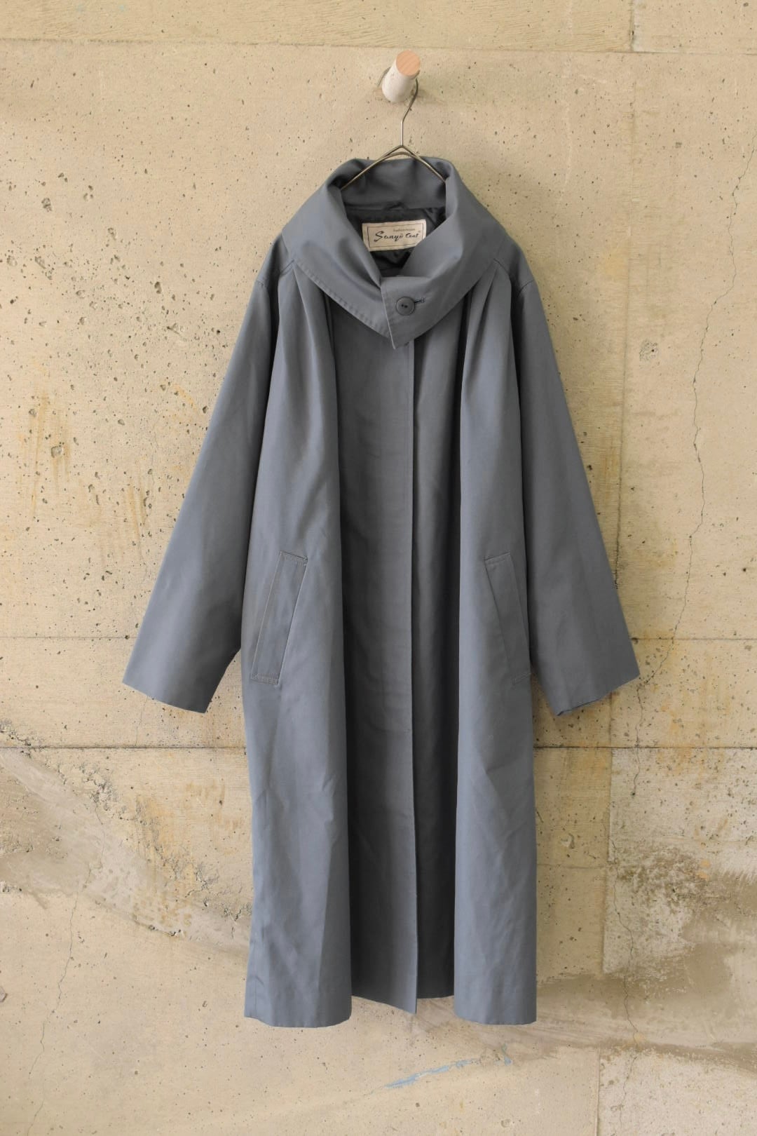 Blue coat with folded collar