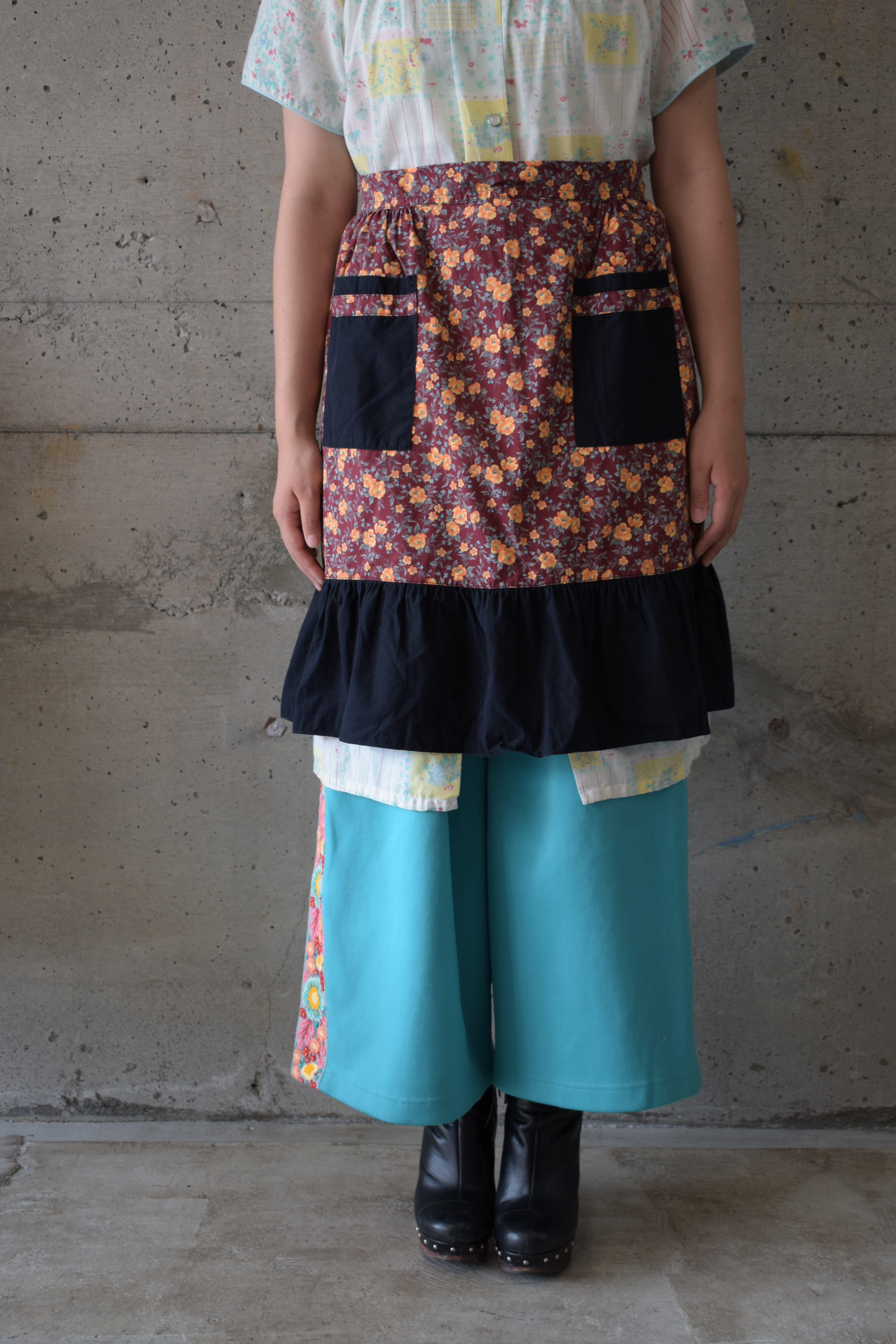 Black and floral apron