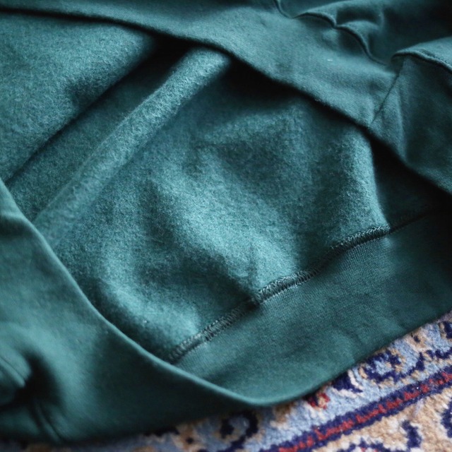 deep green over silhouette sweat parka