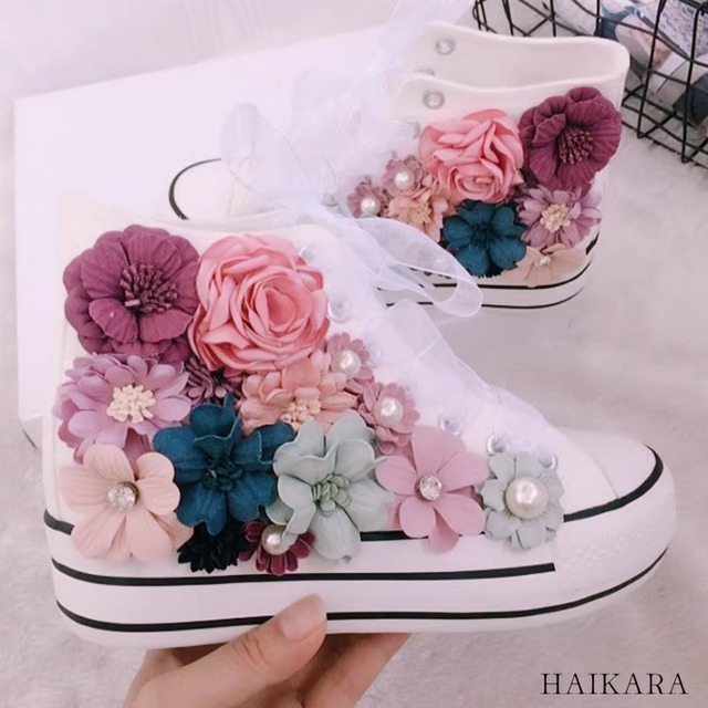 Platform sneakers with three-dimensional colorful floral pattern