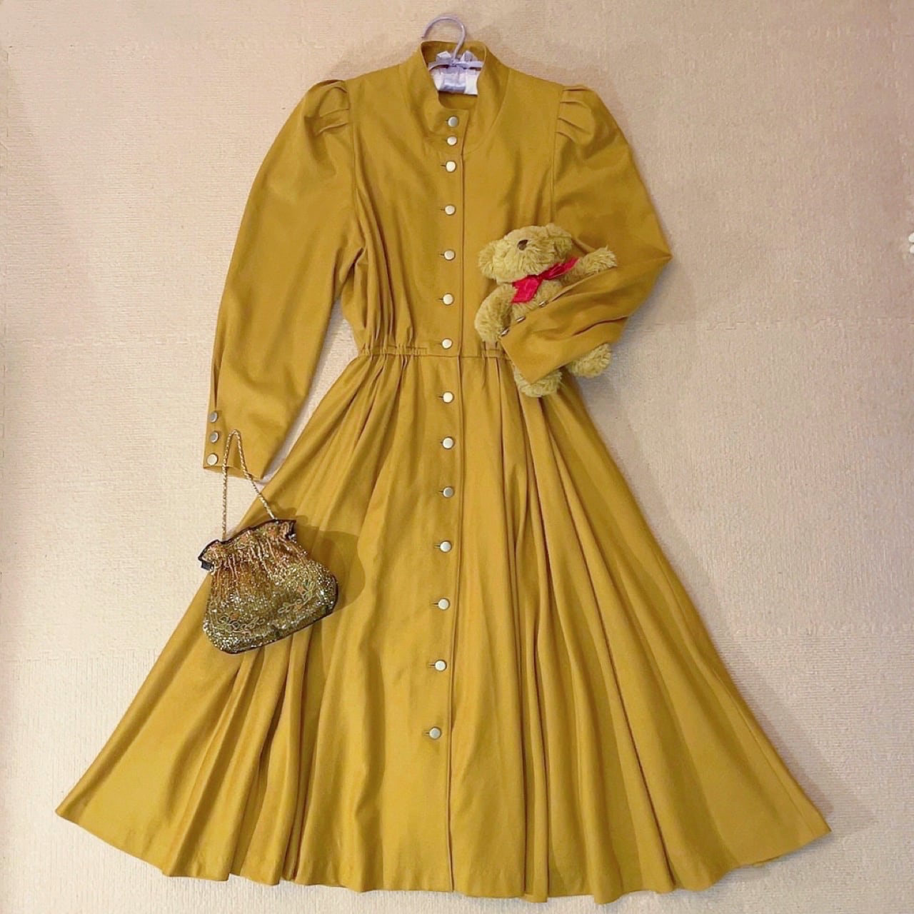 mustard front metal button one-piece