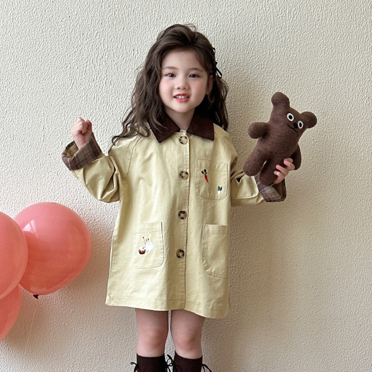 秋ニンジン柄トレンチコート