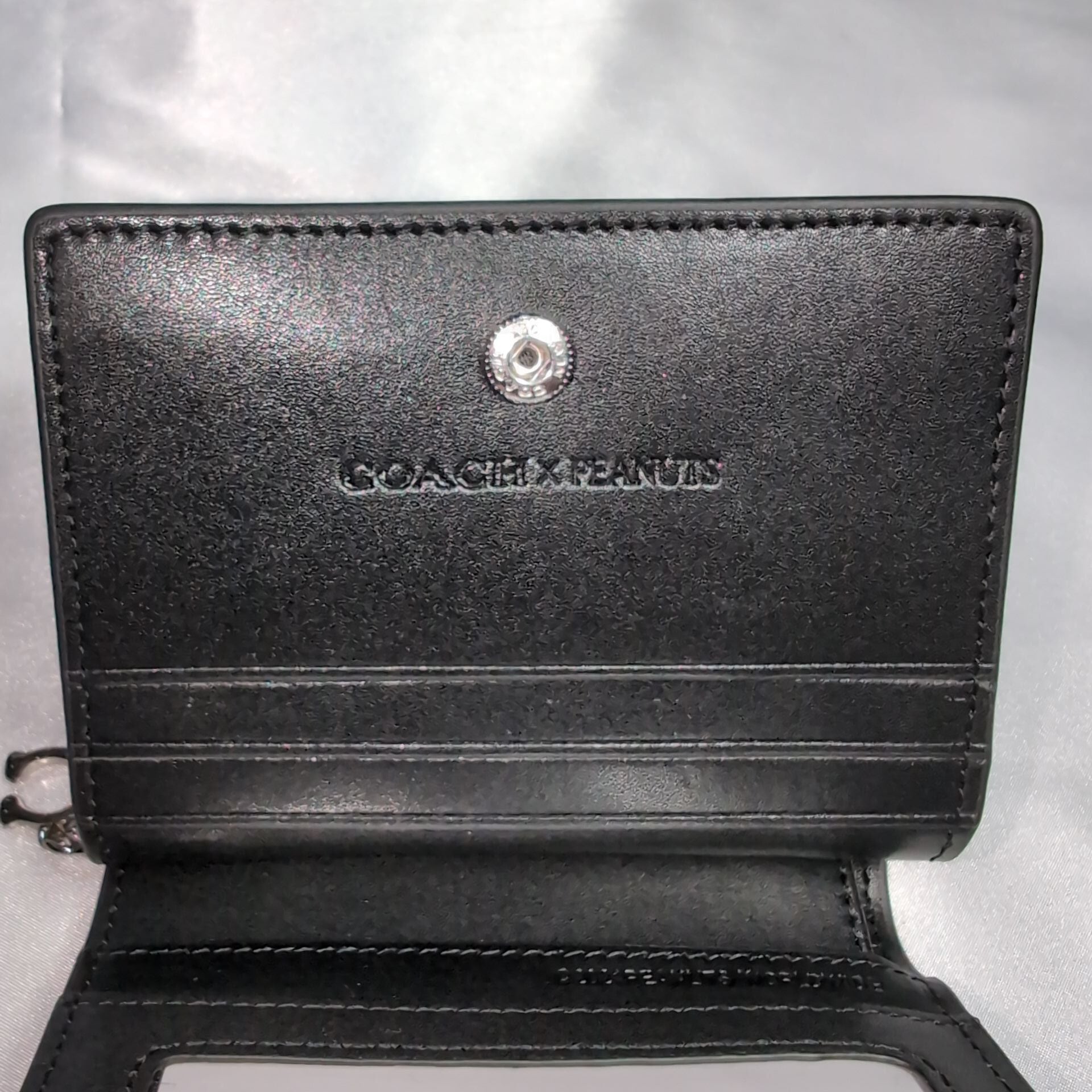 COACH  折り財布　スヌーピー黒 COACHコーチ ラウンドファスナー長財布 ピーナッツコラボ スヌーピー