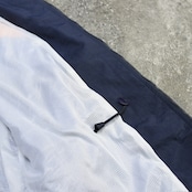 FILA middle length switching design nylon jacket