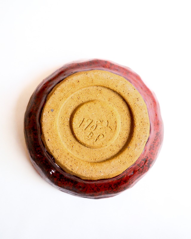 1982 Ceramic red patterned ashtray