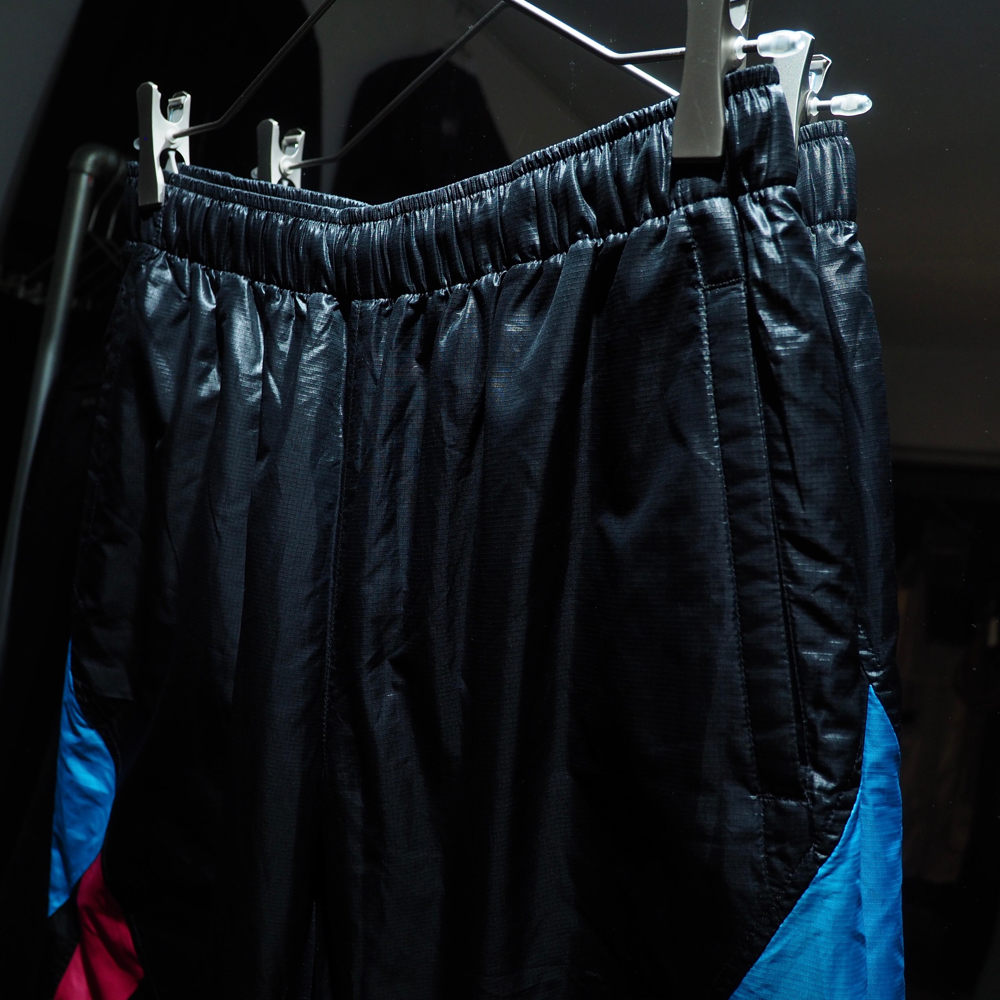 Dark Pink × Neon Blue color panel Switching Cyber track pants