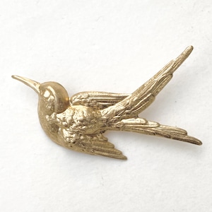 Brass charm brooch - L Bird O-05