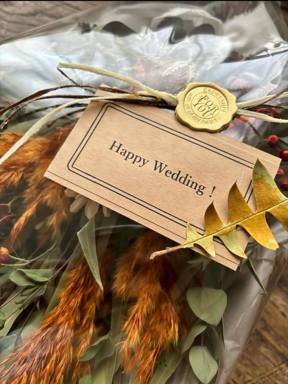 オレンジパンパスグラスとユーカリのスワッグーSサイズー | お花作家の