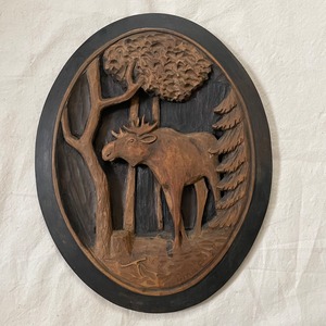 木彫りのヘラジカの壁掛け