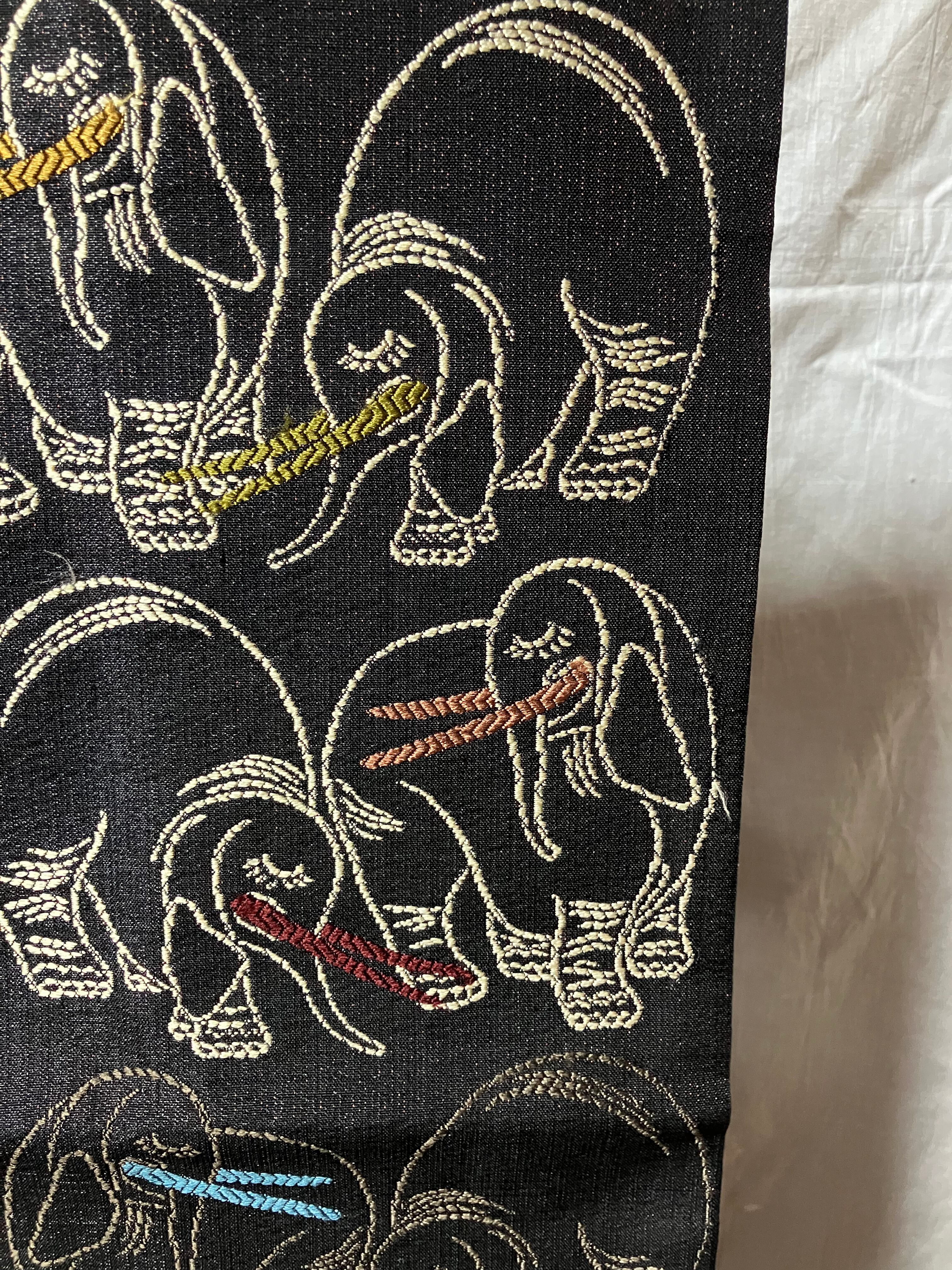 両面使い名古屋帯（黒地象の柄＆黒地クリームぼたんの柄）