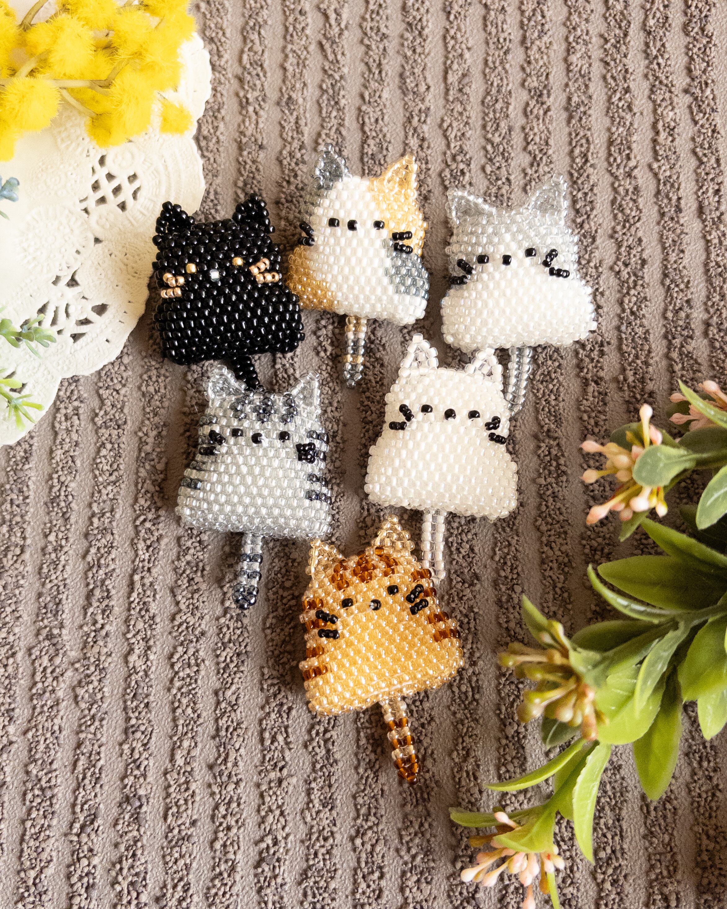 ネコのビーズがま口ポーチ | うさのひみつきち