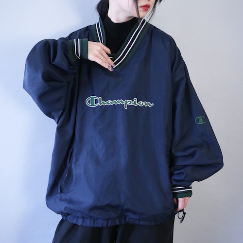 "Champion" front logo design over silhouette nylon pullover