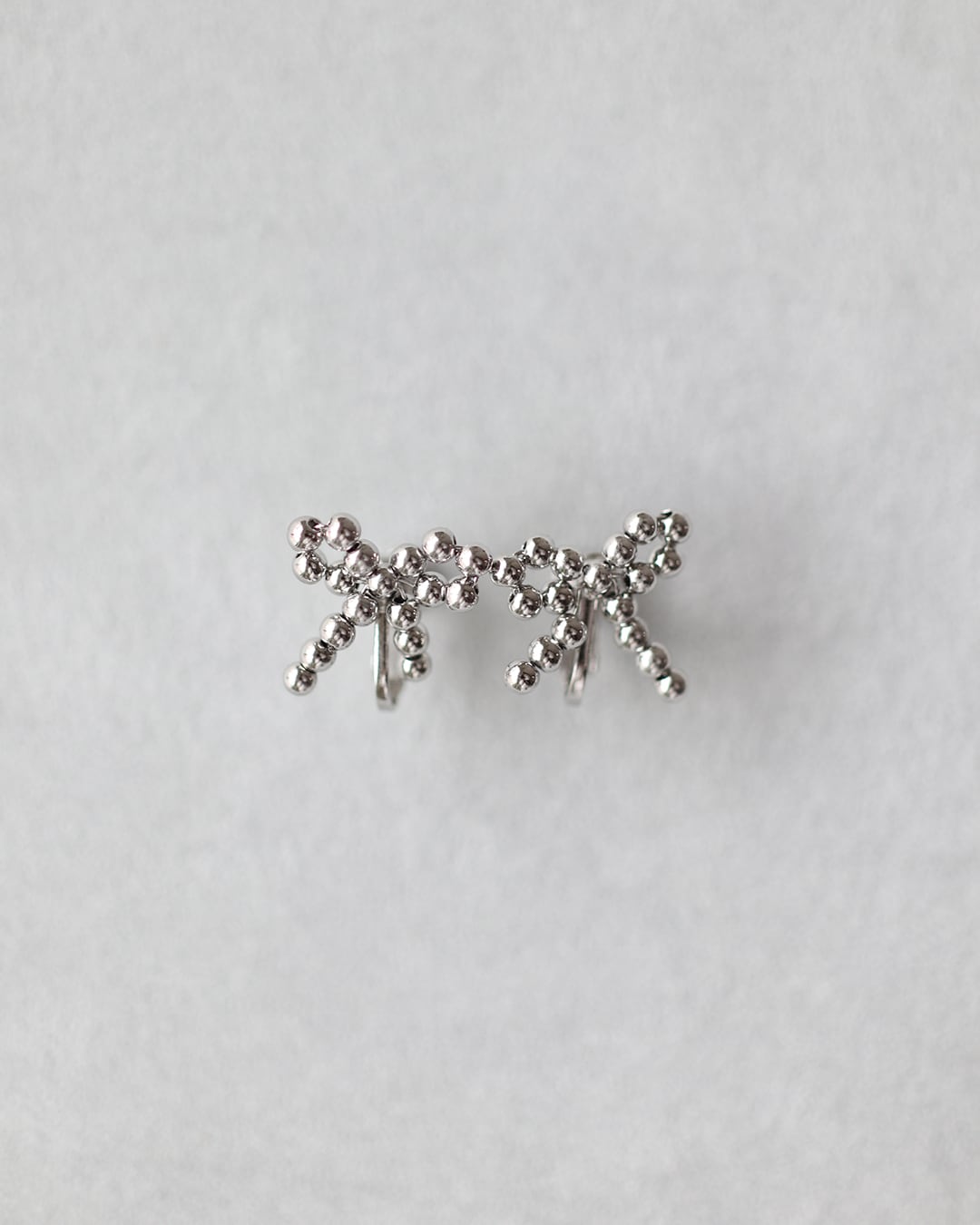 Ribbon earring / Silver