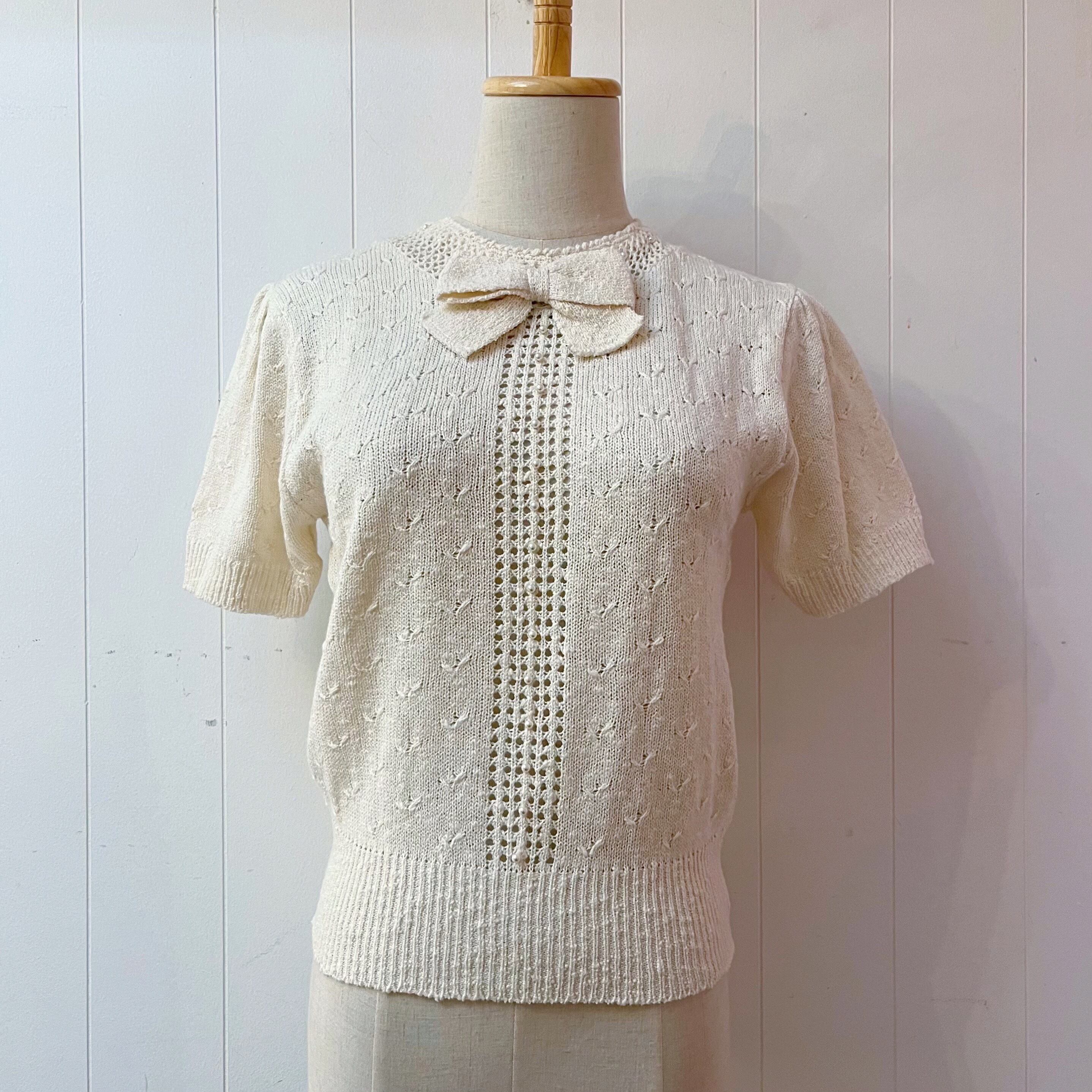 ribbon brooch off white knit po