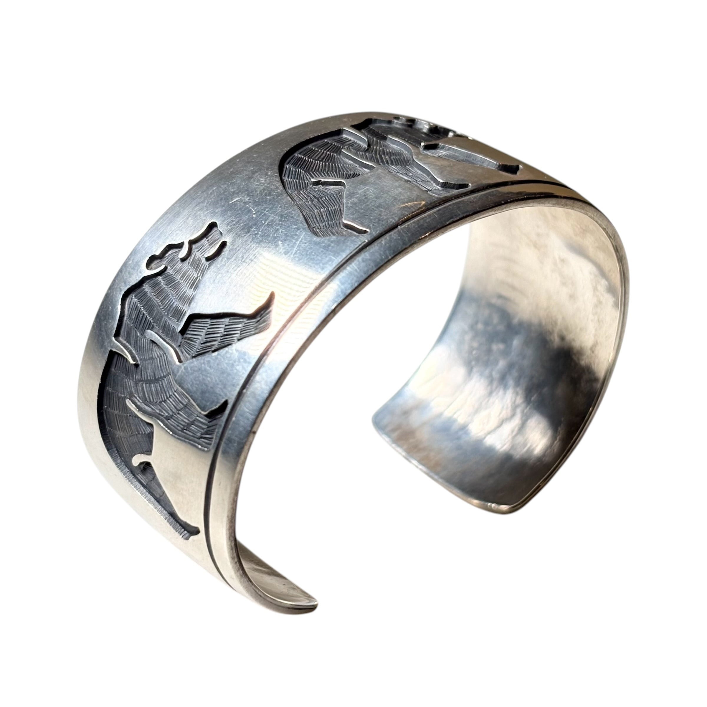 Hopi Lawrence Saufkie silver overlay bangle “walking bear” | NOIR